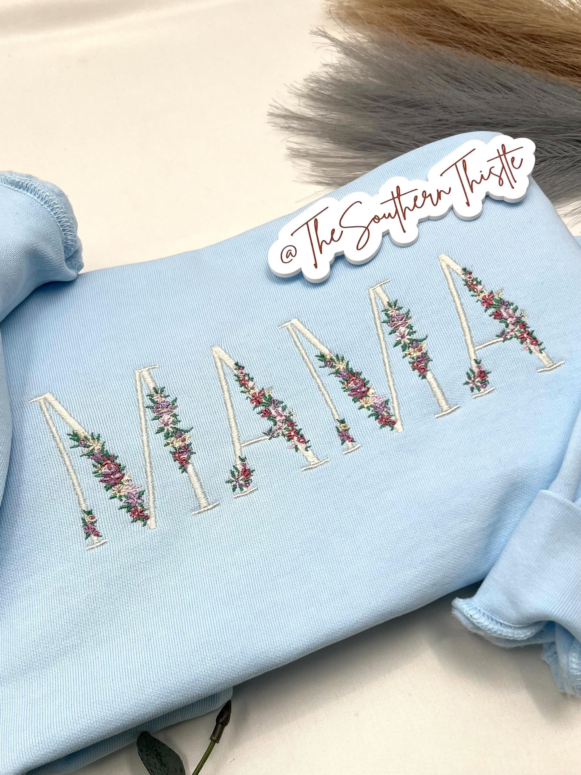 Floral MAMA Embroidered Sweatshirt β Soft Pastel Crewneck with Dainty Flower Letters