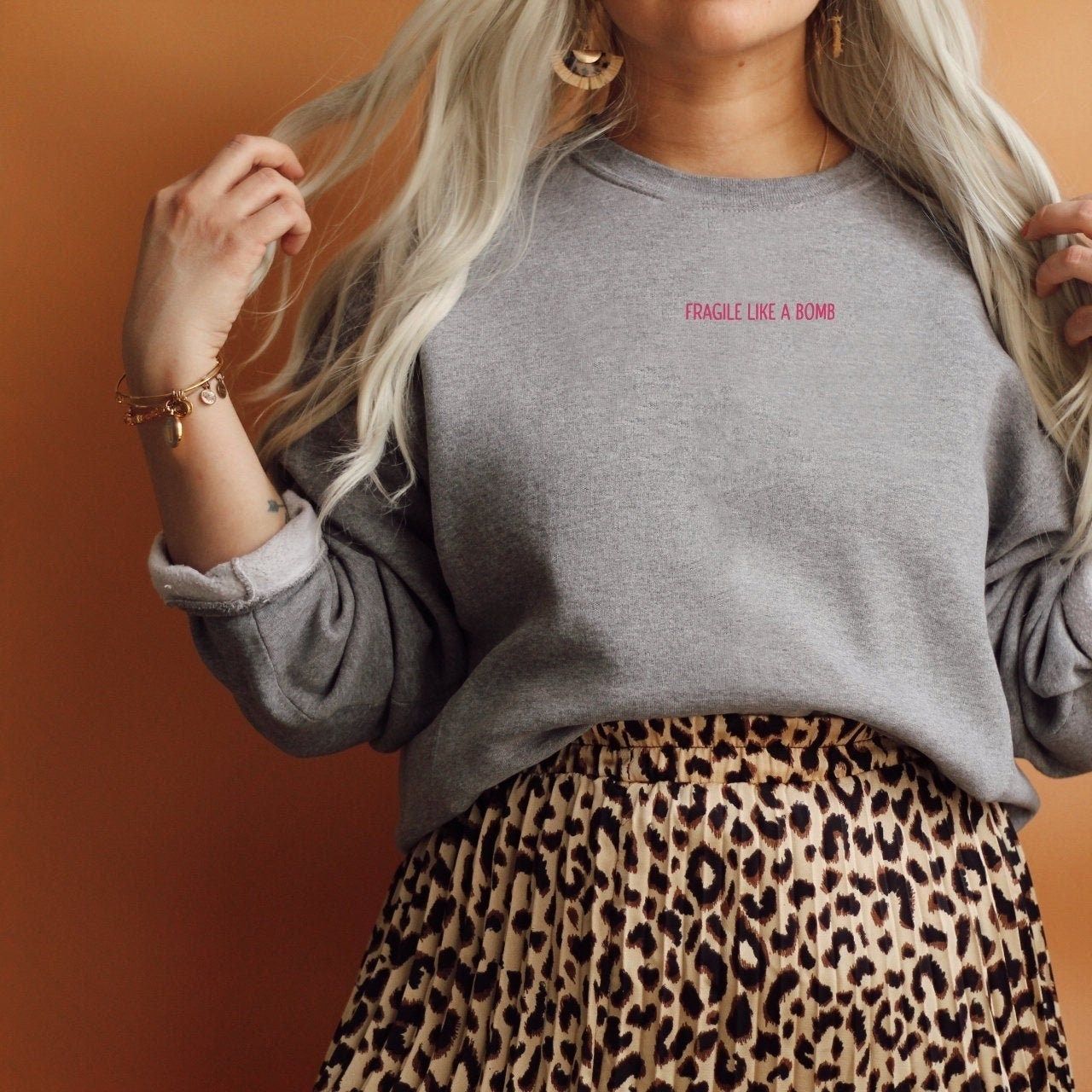 "Fragile Like a Bomb" Embroidered Sweatshirt β Feminist Empowerment Crewneck