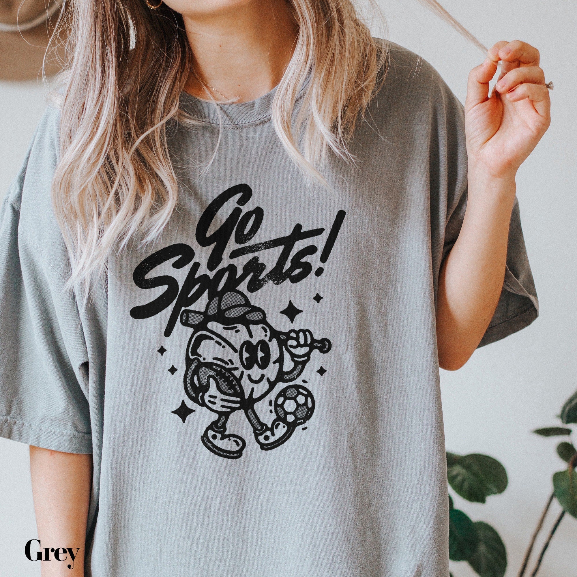 a woman holding a cigarette in her right hand