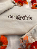 Autumn Icons Embroidered Crewneck Sweatshirt – Cozy Fall Pullover in Neutral Beige