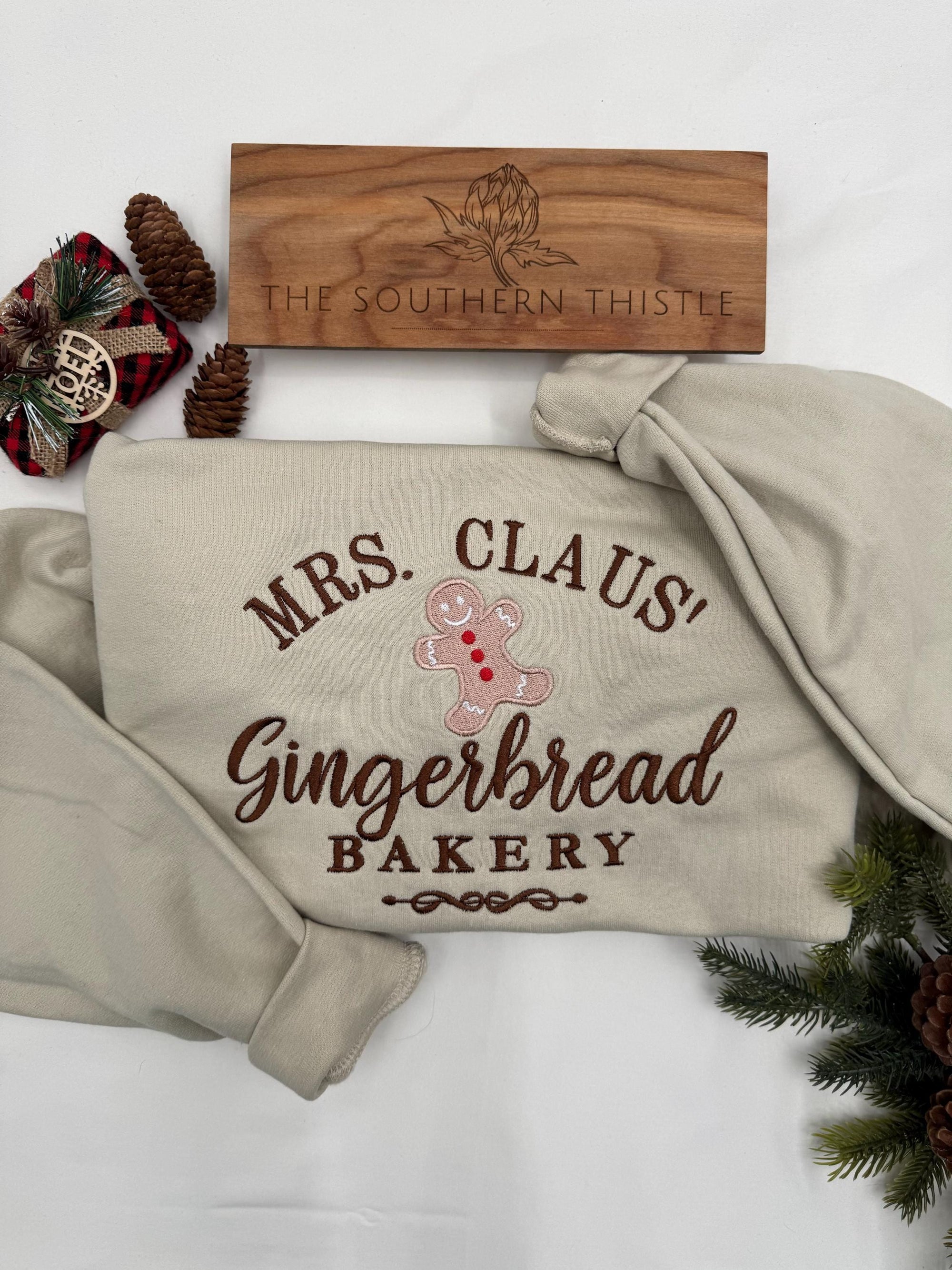 Mrs. Claus’ Gingerbread Bakery Embroidered Sweatshirt – Festive Christmas Crewneck