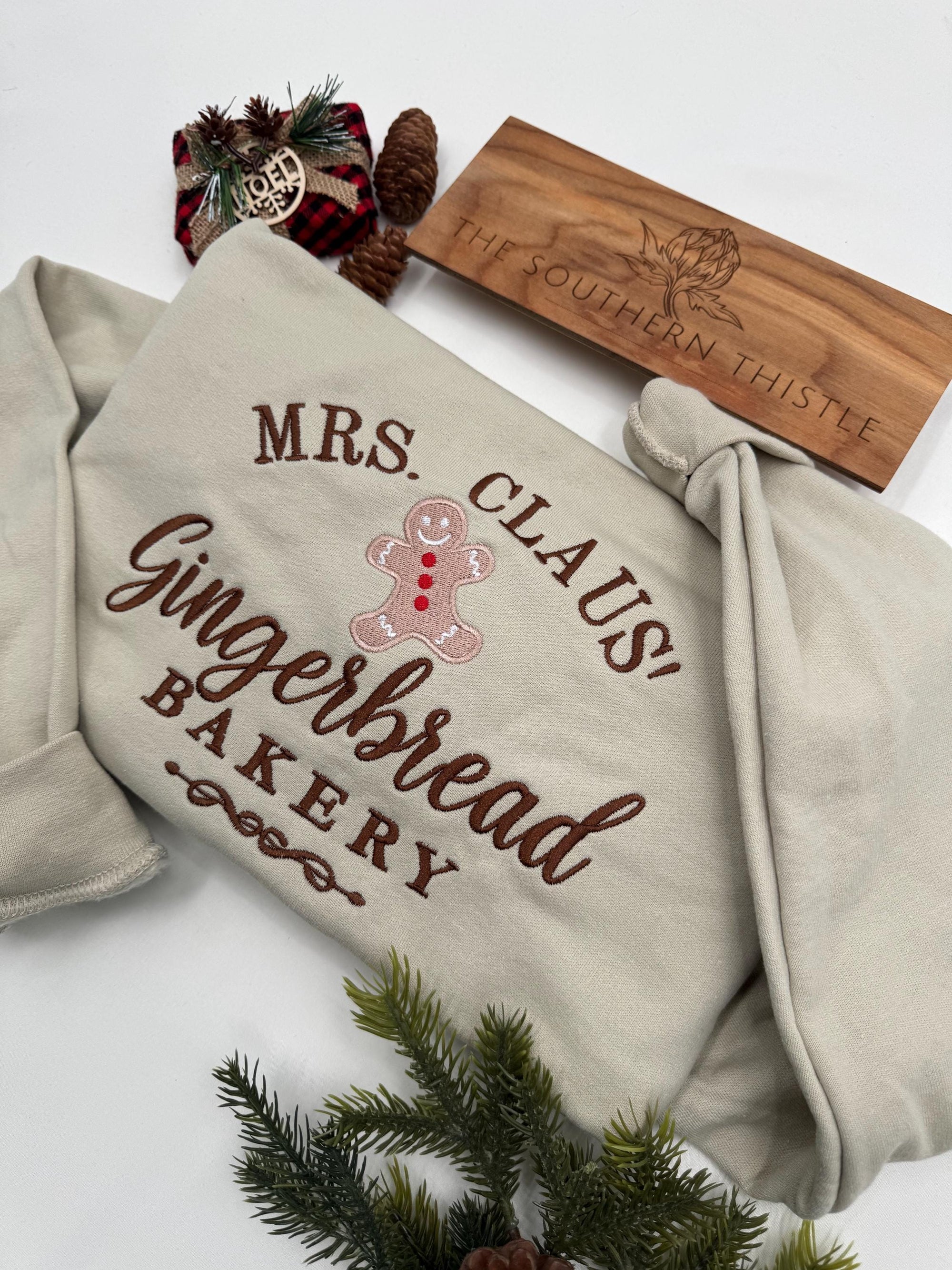 Mrs. Claus’ Gingerbread Bakery Embroidered Sweatshirt – Festive Christmas Crewneck
