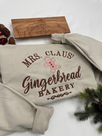 Mrs. Claus’ Gingerbread Bakery Embroidered Sweatshirt – Festive Christmas Crewneck