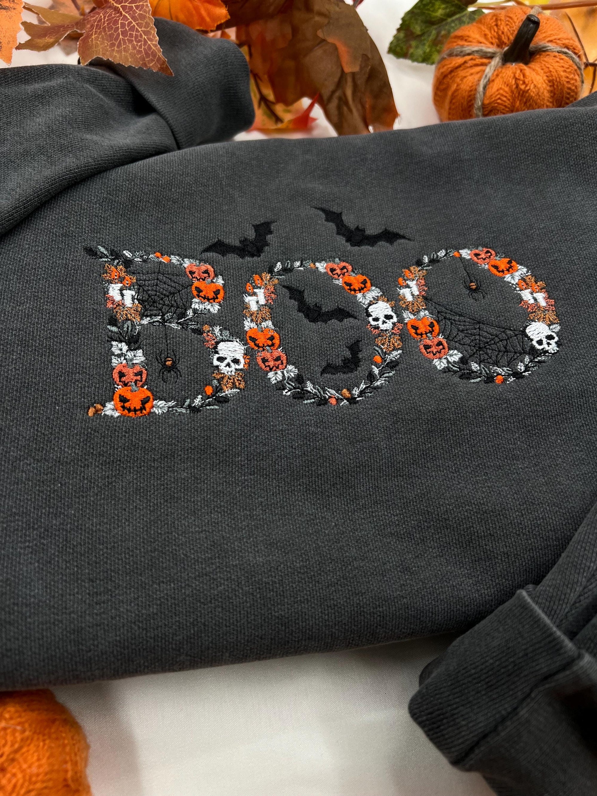 BOO Embroidered Halloween Sweatshirt – Spooky Pullover with Pumpkins, Skulls, and Bats