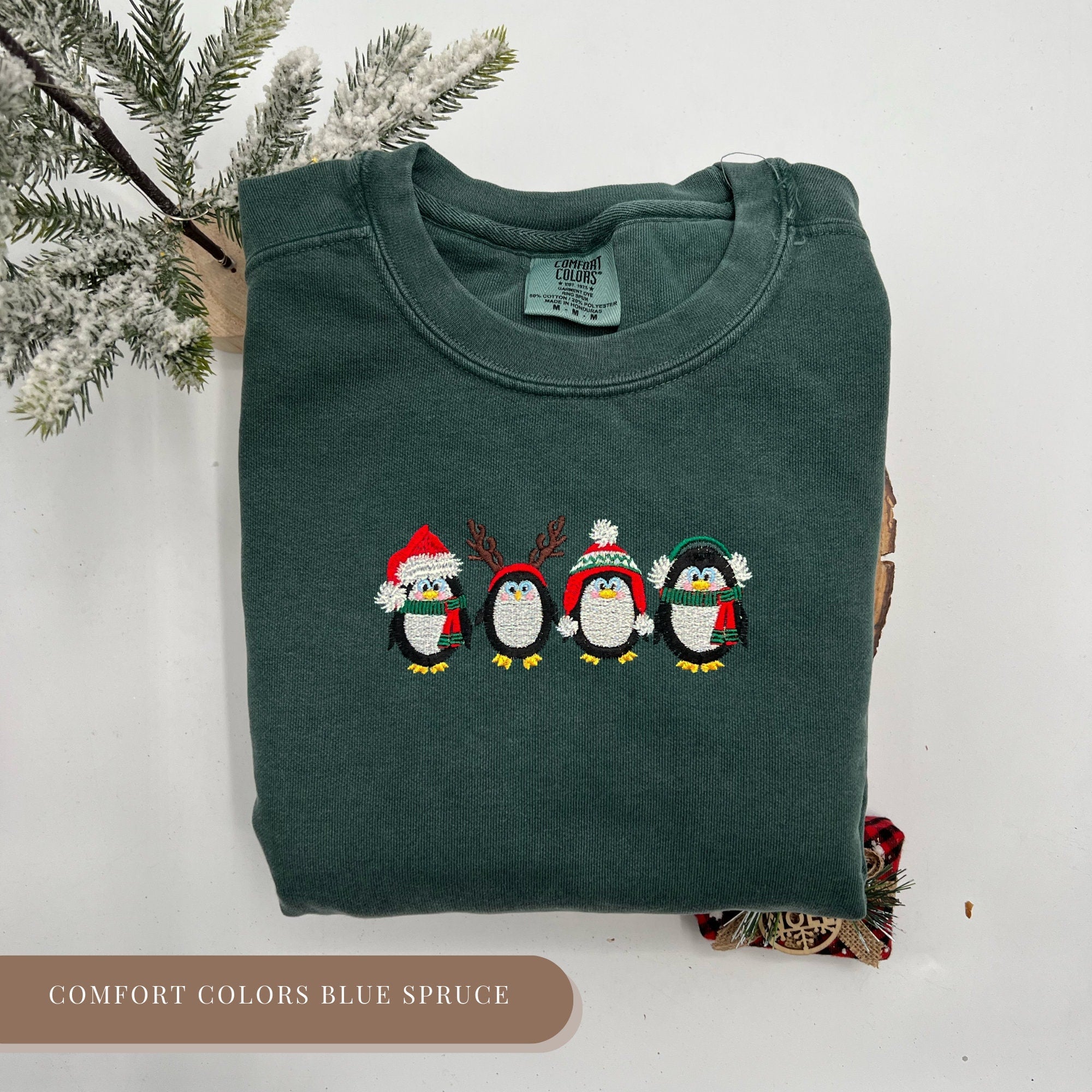 Embroidered Christmas Penguins Sweatshirt