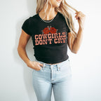 a woman wearing a cowgirls don&#39;t cry t - shirt