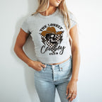 a woman wearing a grey shirt with a cowboy hat on it
