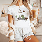 a woman holding a drink in her hand