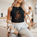 a woman wearing a crop top with a horse on it