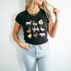 a woman wearing a t - shirt with animals on it