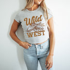 a woman wearing a wild west t - shirt
