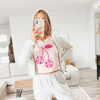 a woman taking a selfie in her pajamas