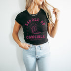 a woman wearing a black shirt with a cowboy boot on it