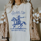 a woman wearing a t - shirt with a picture of a cowboy riding a horse