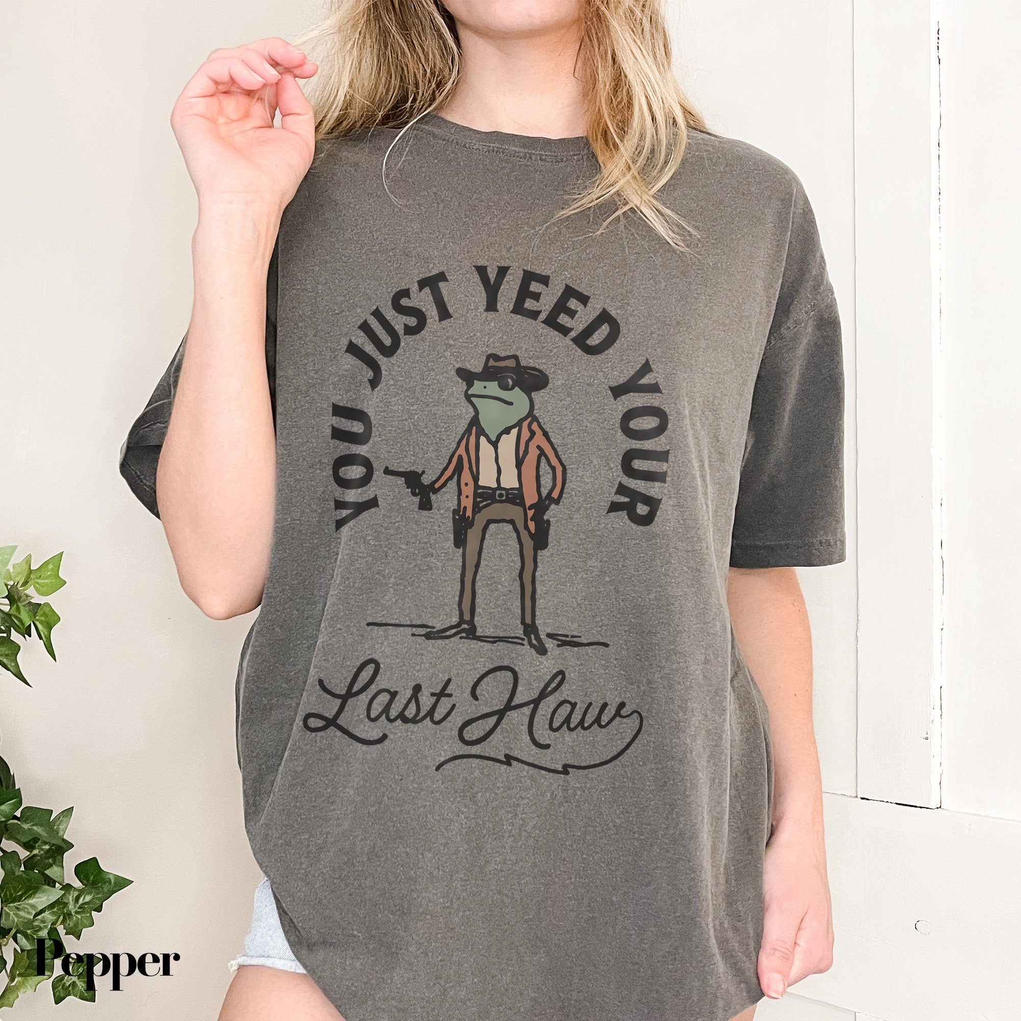 a woman wearing a t - shirt that says, you just need your last claw