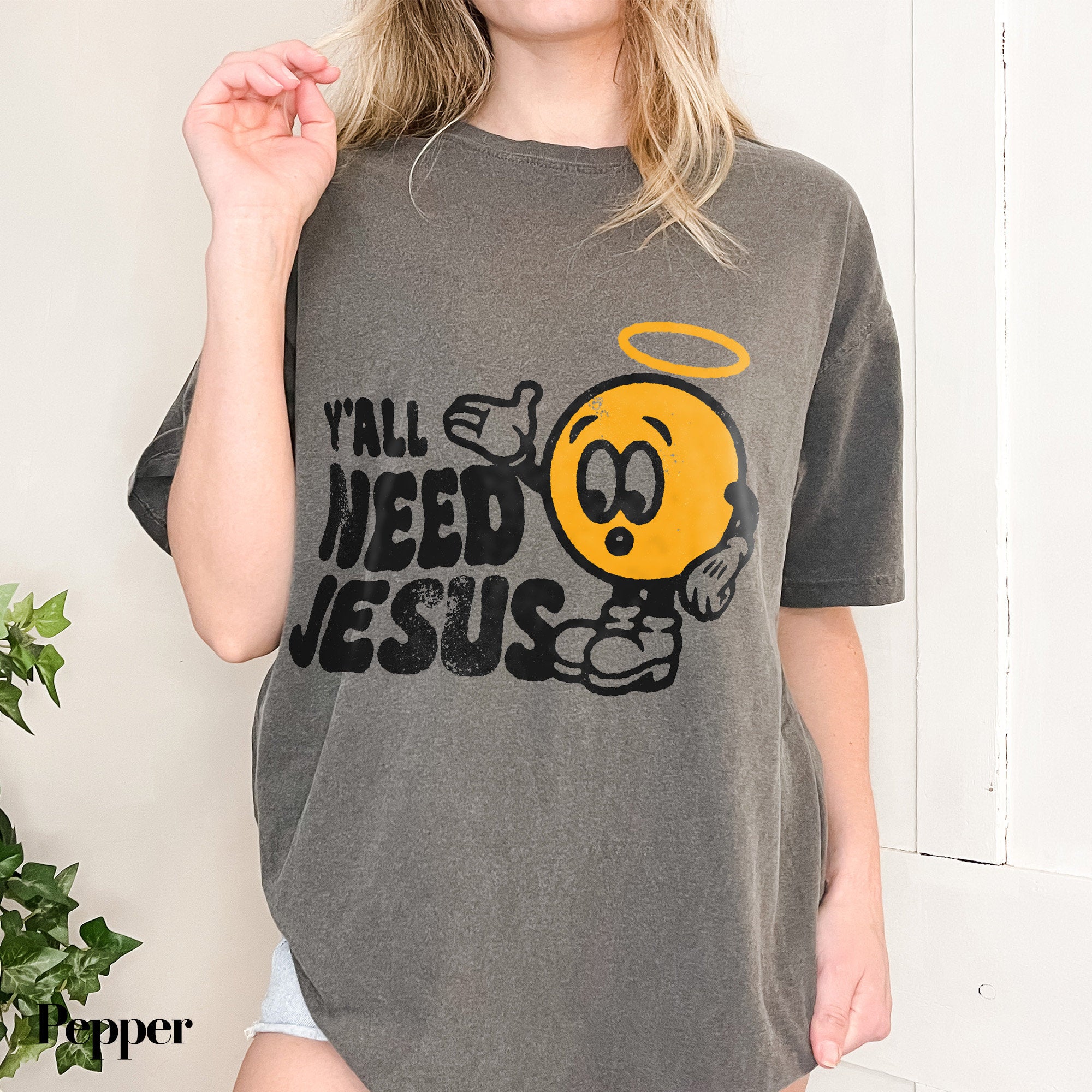a woman wearing a t - shirt that says i&#39;ll need jesus