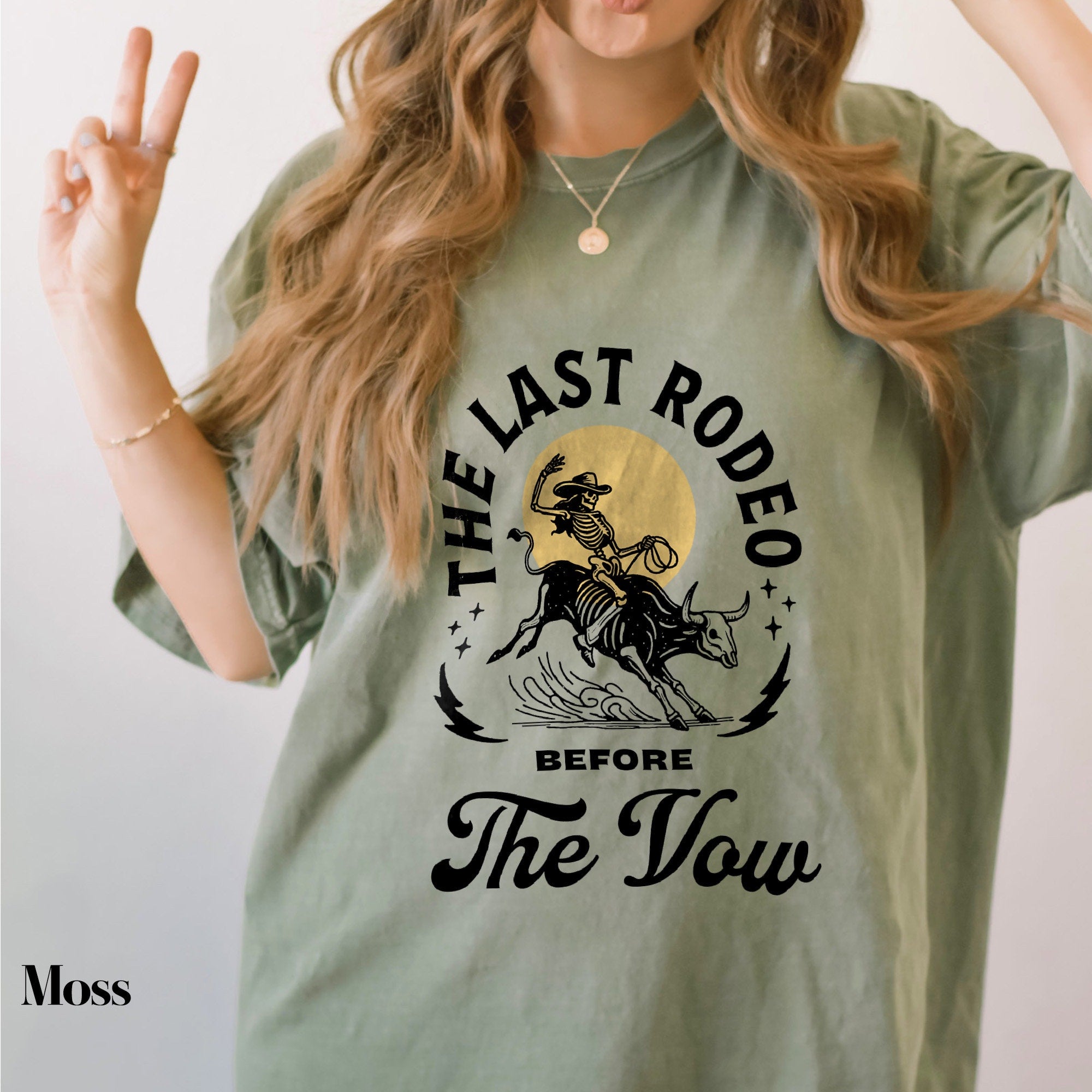 a woman wearing a t - shirt that says the last rodeo before the slow