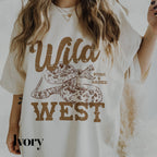 a woman wearing a wild west t - shirt and smoking a cigarette