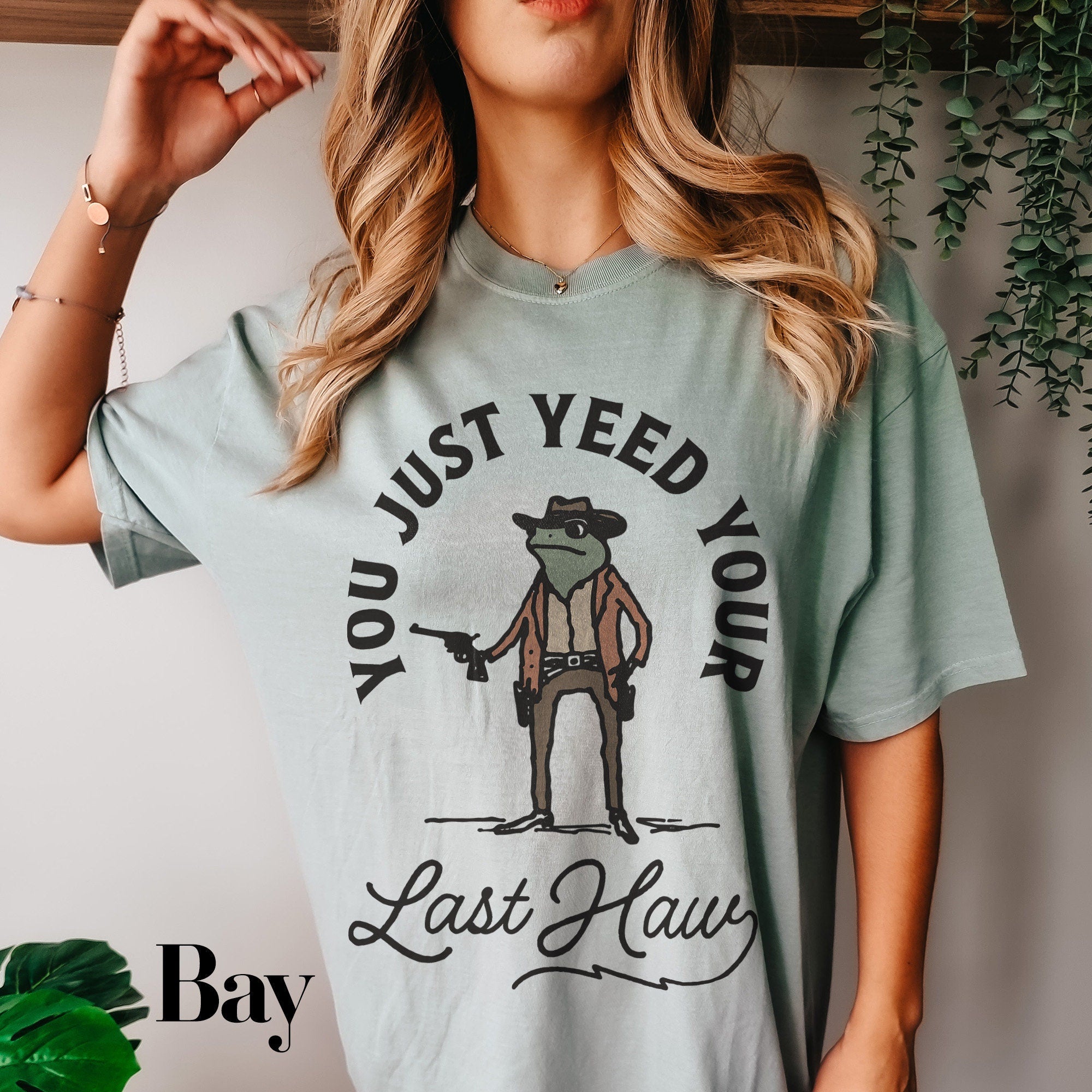 a woman wearing a t - shirt that says, you just need your last claw