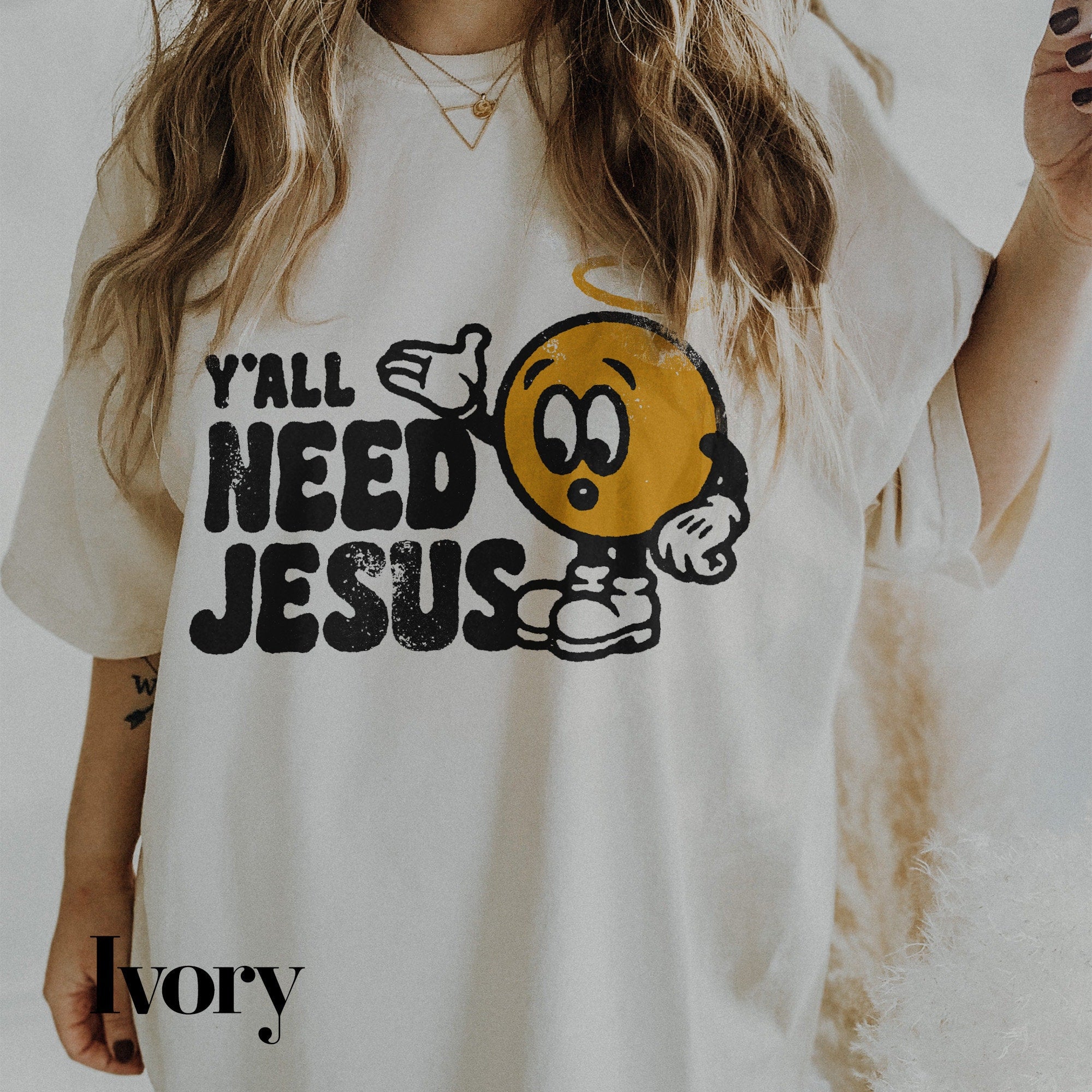 a woman wearing a t - shirt that says y&#39;all need jesus