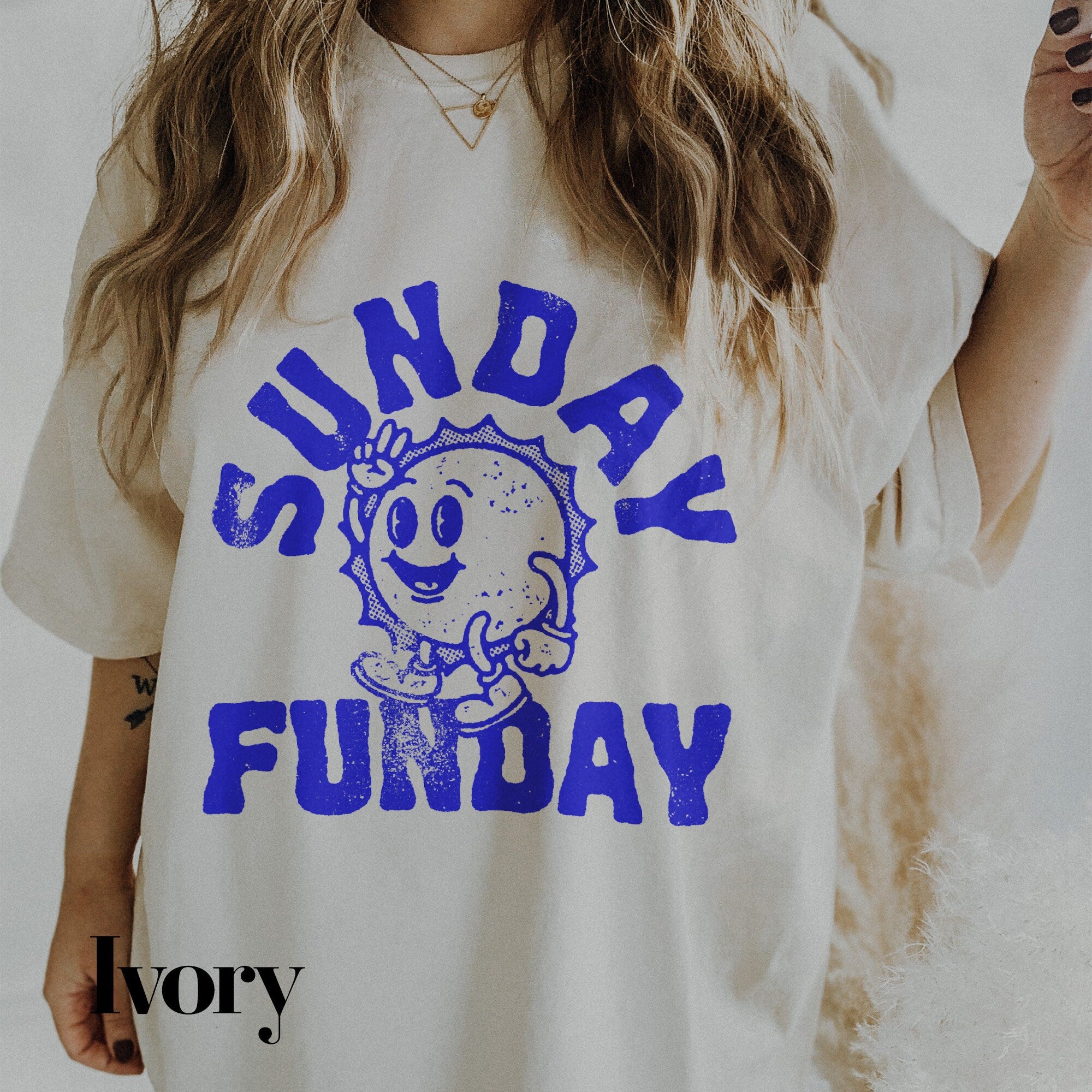a woman wearing a shirt that says sunday fund day