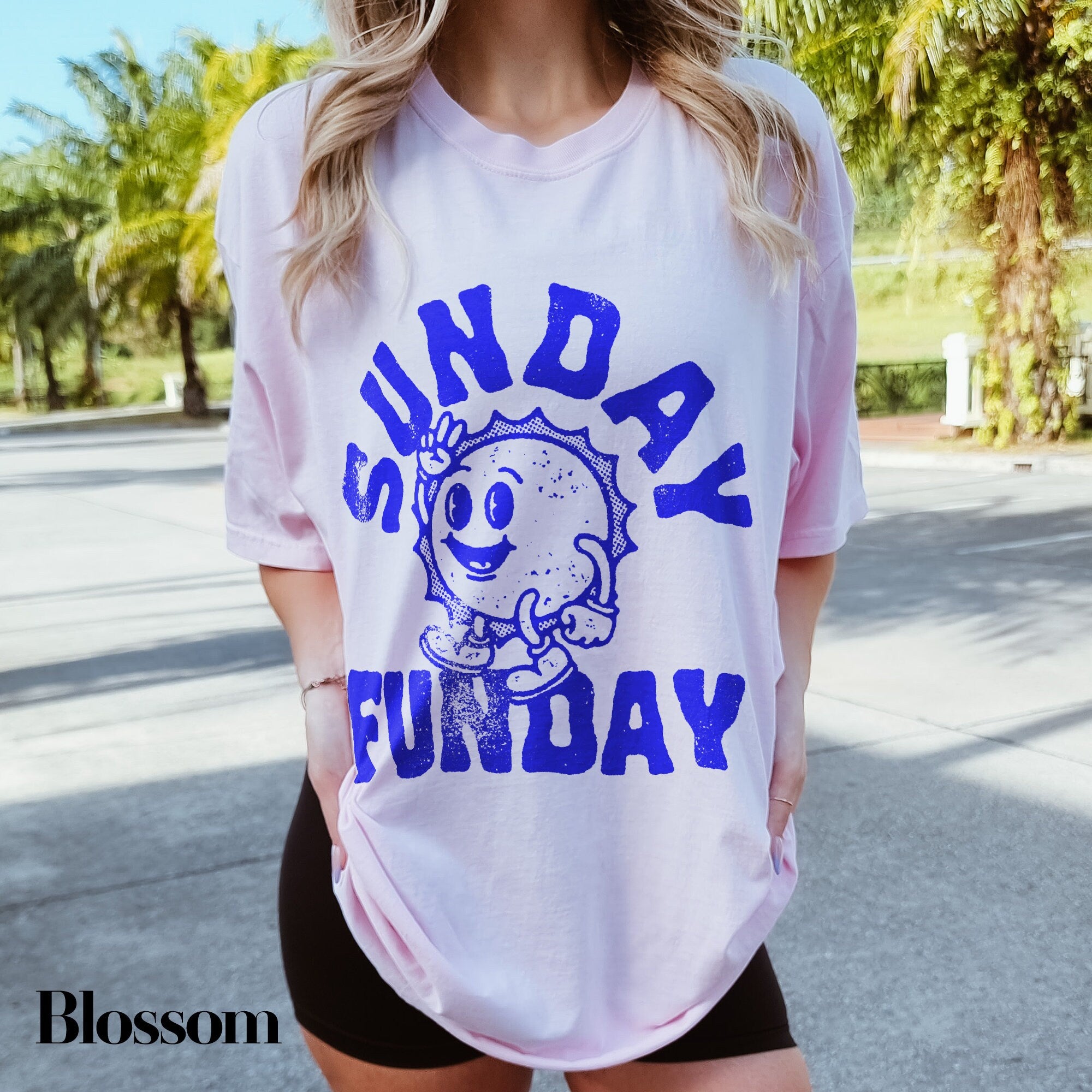 a woman wearing a shirt that says sunday fundday