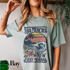 a woman wearing a t - shirt that says his mercies are new every morning
