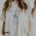 a woman wearing a cowboy t - shirt and smoking a cigarette