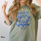 a woman with long hair wearing a green shirt