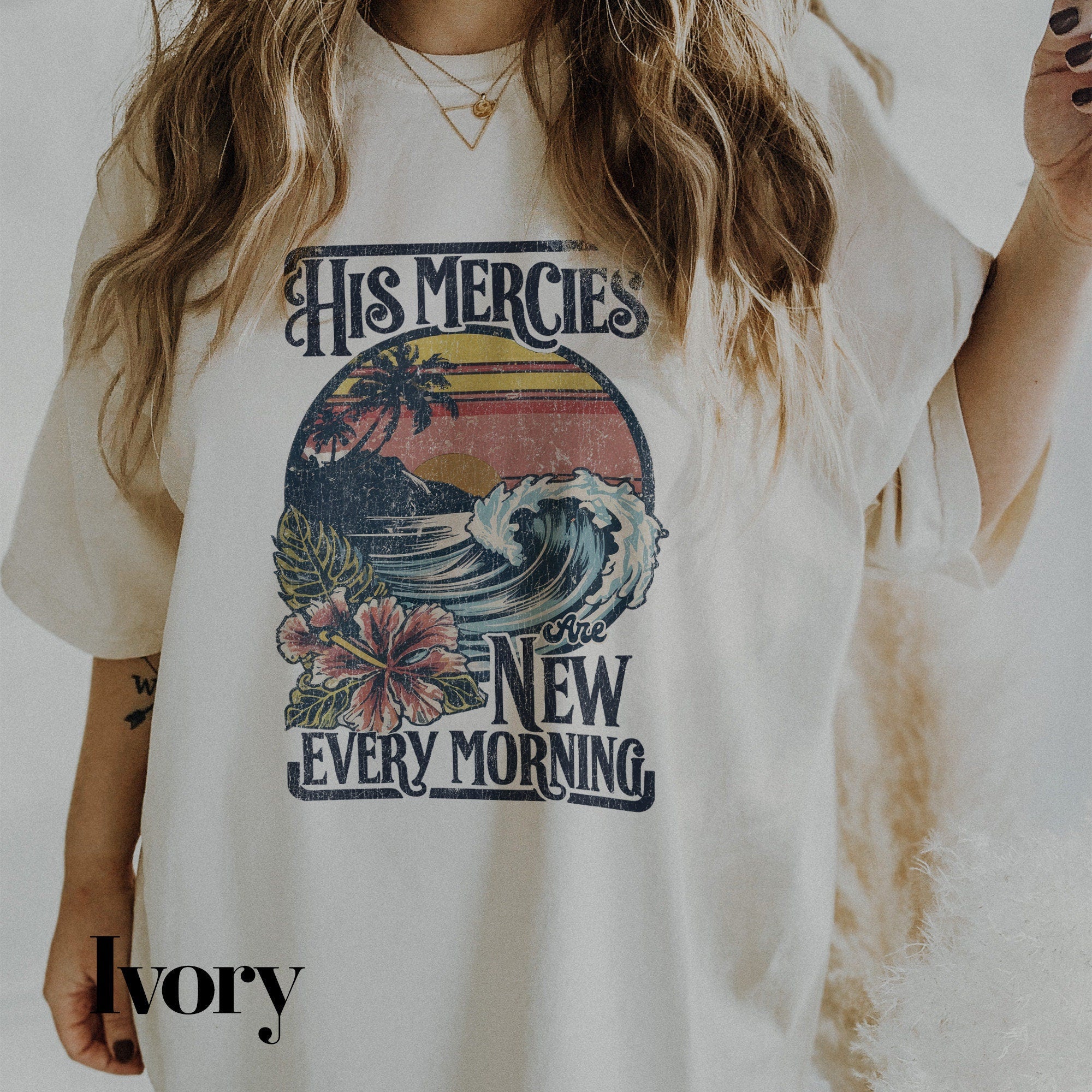 a woman wearing a t - shirt that says his mercies new every morning