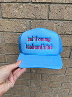 Embroidered Put it on My Husbands Tab Trucker Hat