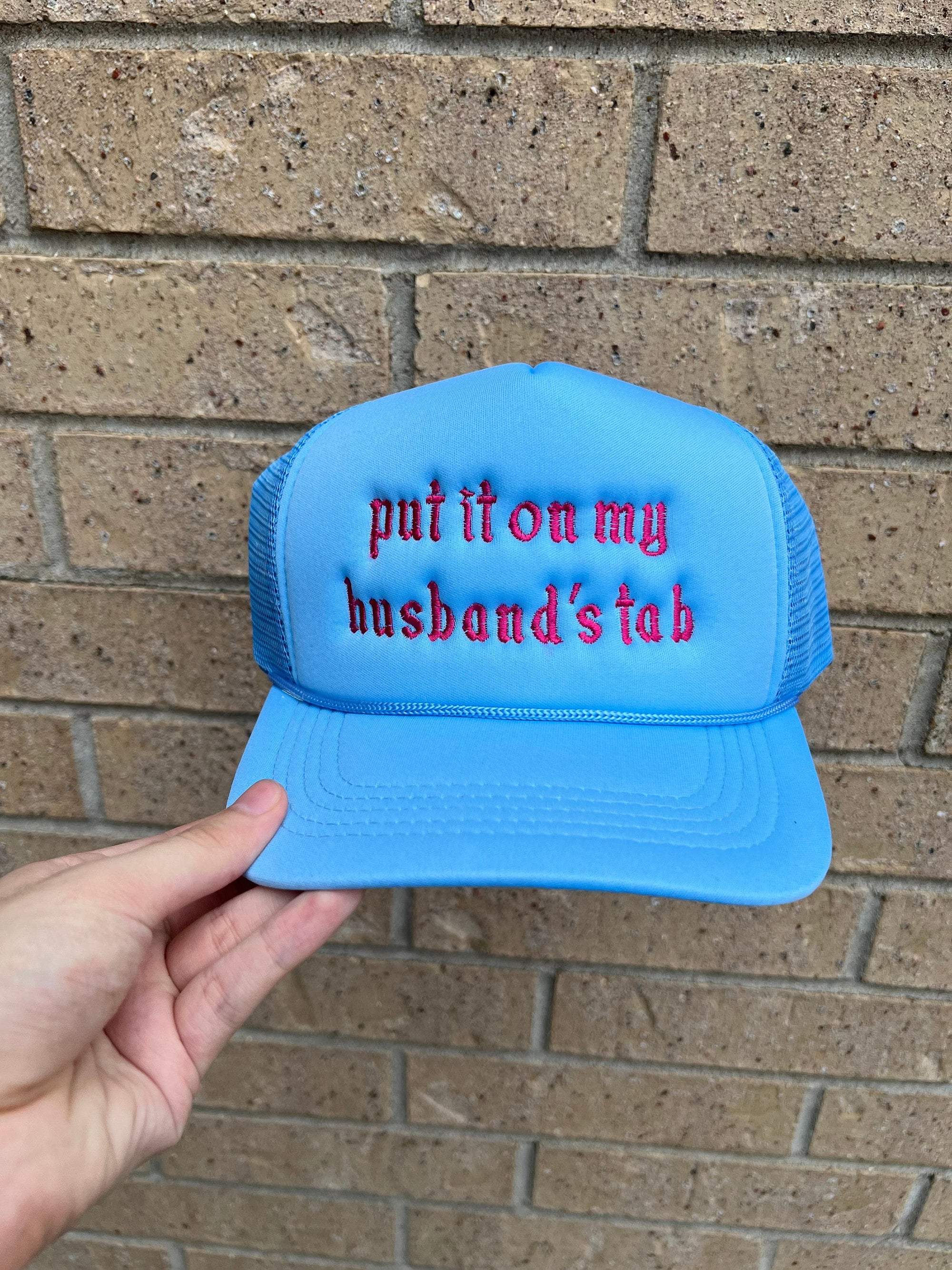 Embroidered Put it on My Husbands Tab Trucker Hat