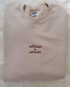 Embroidered Caffeinate And Advocate Sweatshirt
