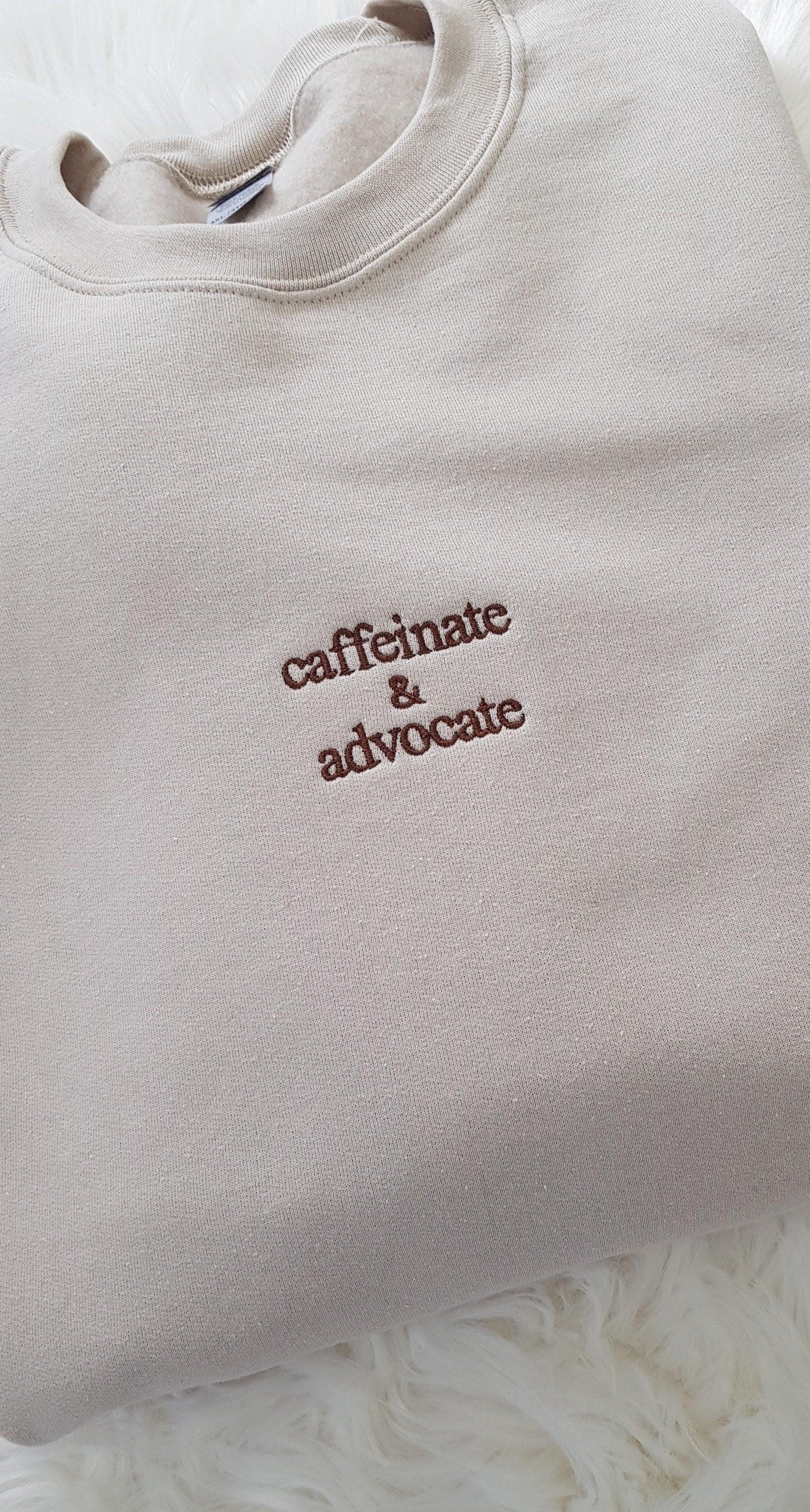 Embroidered Caffeinate And Advocate Sweatshirt