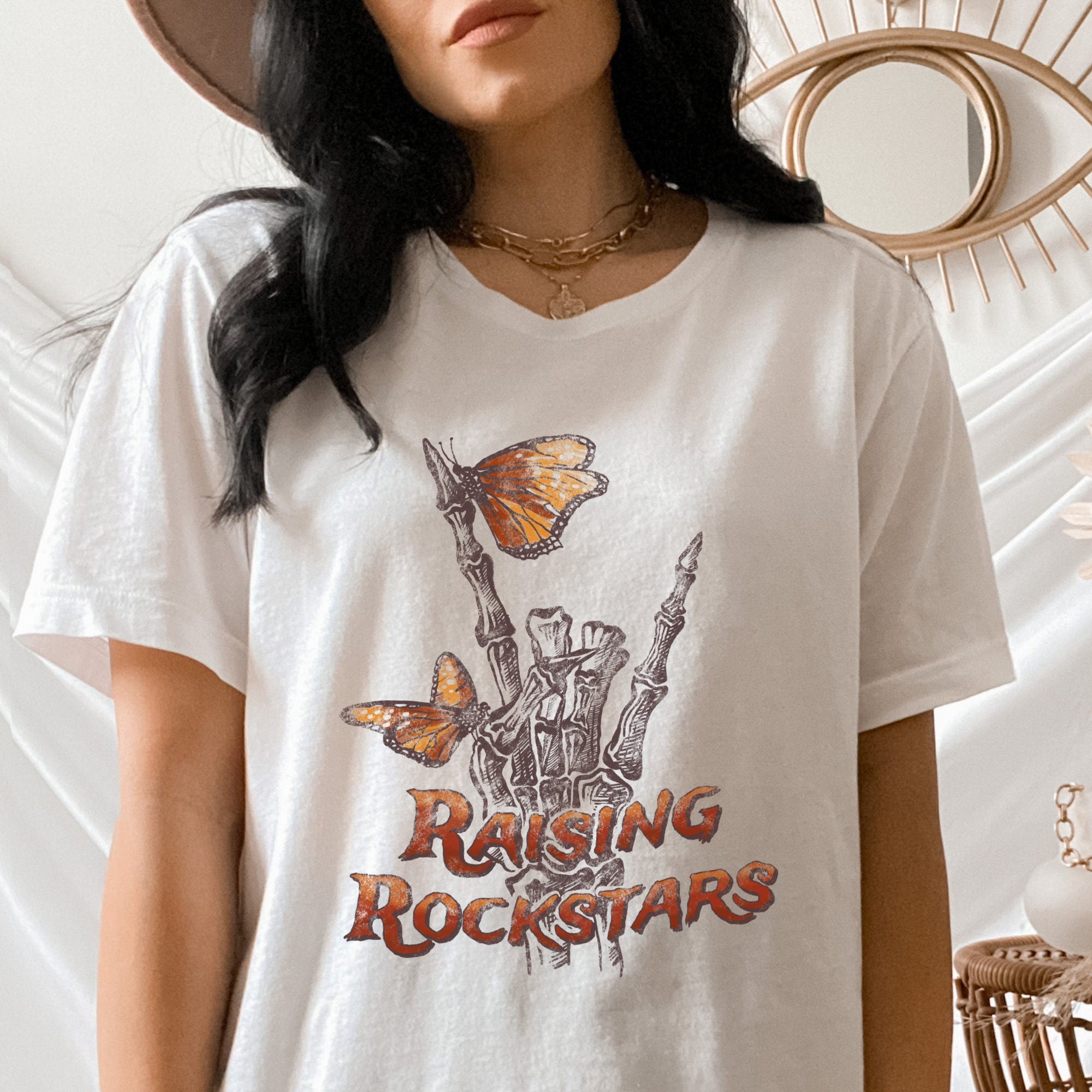 Raising Rockstars" Skeleton Hand Shirt
